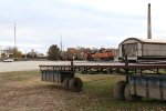 9380 heads away past a stored mobile river dock